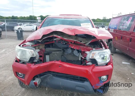 2015 Toyota Tacoma Base V6 z USA, uszkodzony, nr VIN 3TMLU4EN4FM167125